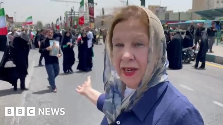 Anger and uncertainty in Iran as crowds mourn dead