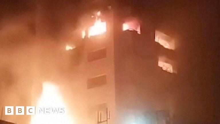 Footage shows explosions and buildings ablaze in Tehran, Iran